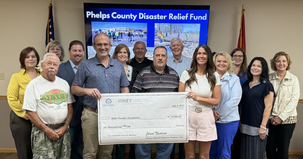 Matthew Evans and Stevie Kearse of the Rolla Chamber Foundation, along with other Chamber Foundation members, accept a $10,000 grant from the Phelps County Disaster Relief Fund to assist businesses impacted by the March 14 tornado in Rolla and Phelps County. Board members of Meramec Regional Community Foundation and the Phelps County Community Foundation made the grant award at the July 9 Annual Meeting of the MRCF. 